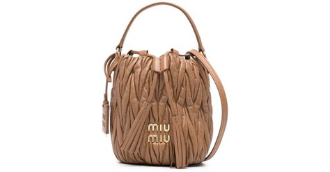 miu miu matelassé leather bucket bag|farfetch miu michael bags.